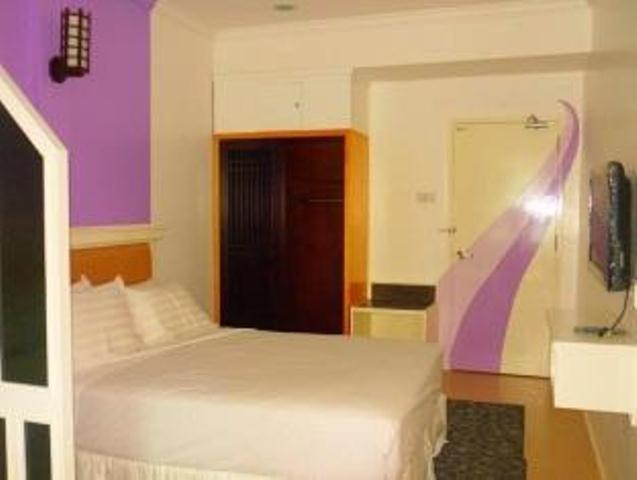 Borneo Cove Hotel Sandakan Bagian luar foto