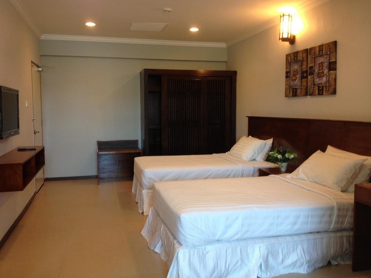Borneo Cove Hotel Sandakan Bagian luar foto