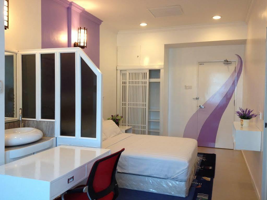 Borneo Cove Hotel Sandakan Bagian luar foto